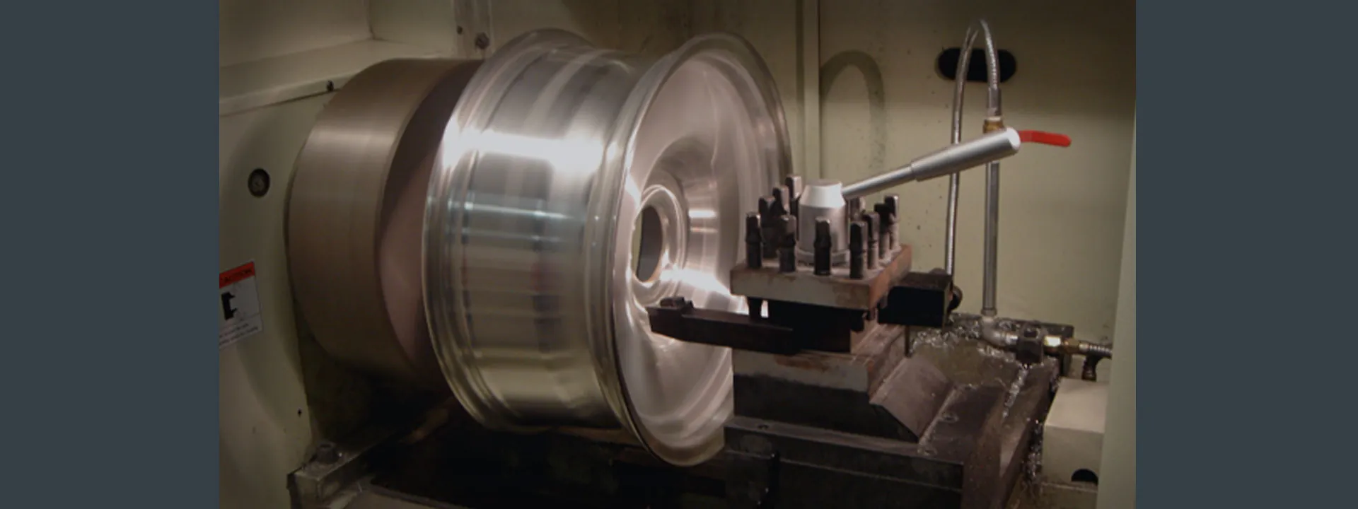 Alloy wheel being machined on a CNC lathe